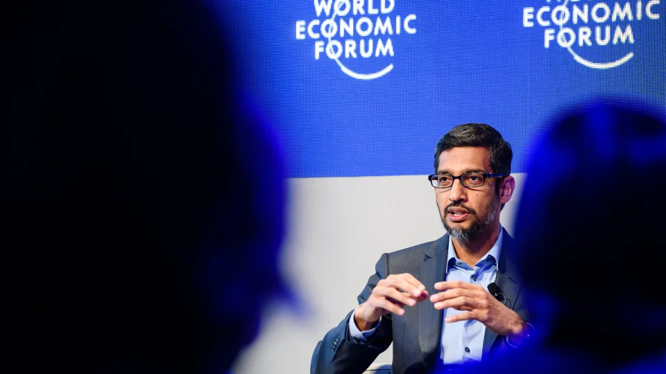 Google CEO Sundar Pichai speaking at the World Economic Forum. Sundar pichai on padcast with Alex on AI advancement and cloud computing resource trade-offs.